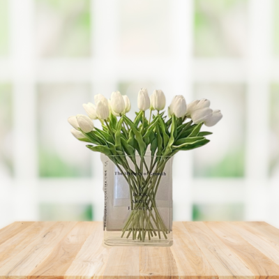 book vase of flowers - book of tulips or dahlias