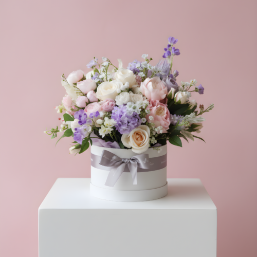 Violetta Serenade Valentine’s designer’s choice flowers in lavender blush and ivory hatbox