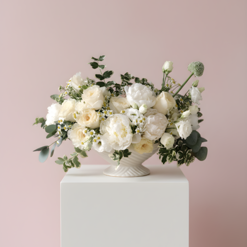 Ivory Atelier neutral Valentine flower arrangement in a white compote bowl with white and ivory blooms