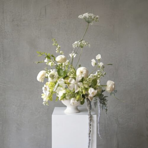 Once-and-Florall-Designs-Linen-Moss-green-and-white-organic-floral-arrangement-white-column-St-Augustine-florist